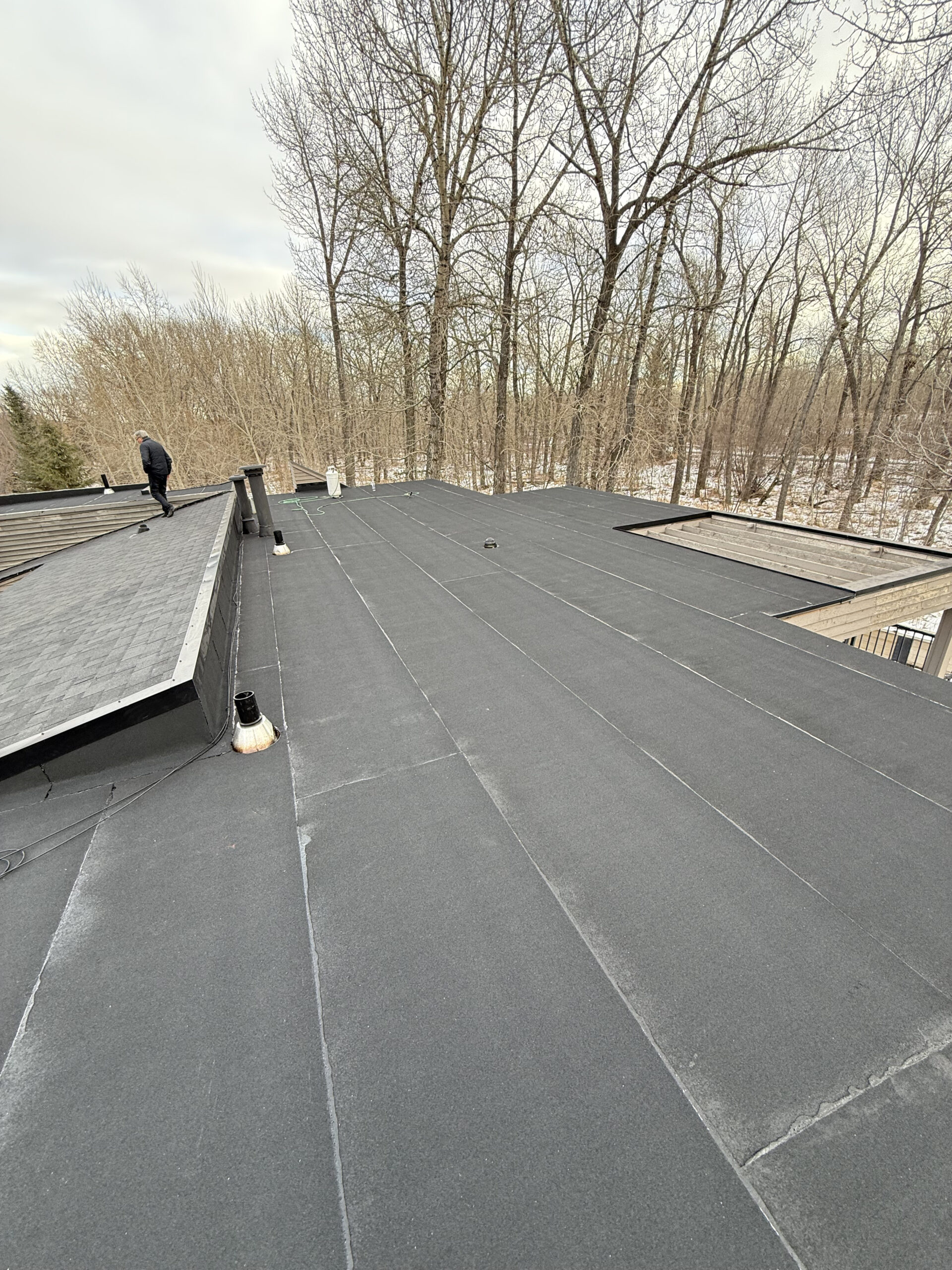 Completed dark rubber membrane flat roof