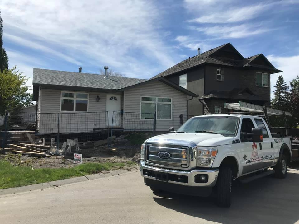Real Canadian Roofing truck on a job in Calgary